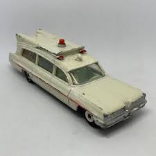 DINKY 263 Superior Ambulance Plastic stretcher with patient grey blanket painted - Each - (17897)