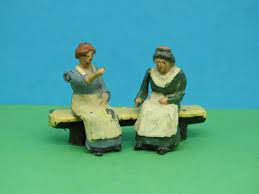 BRITAINS 556 Female villager seated arm - Each - (21137)